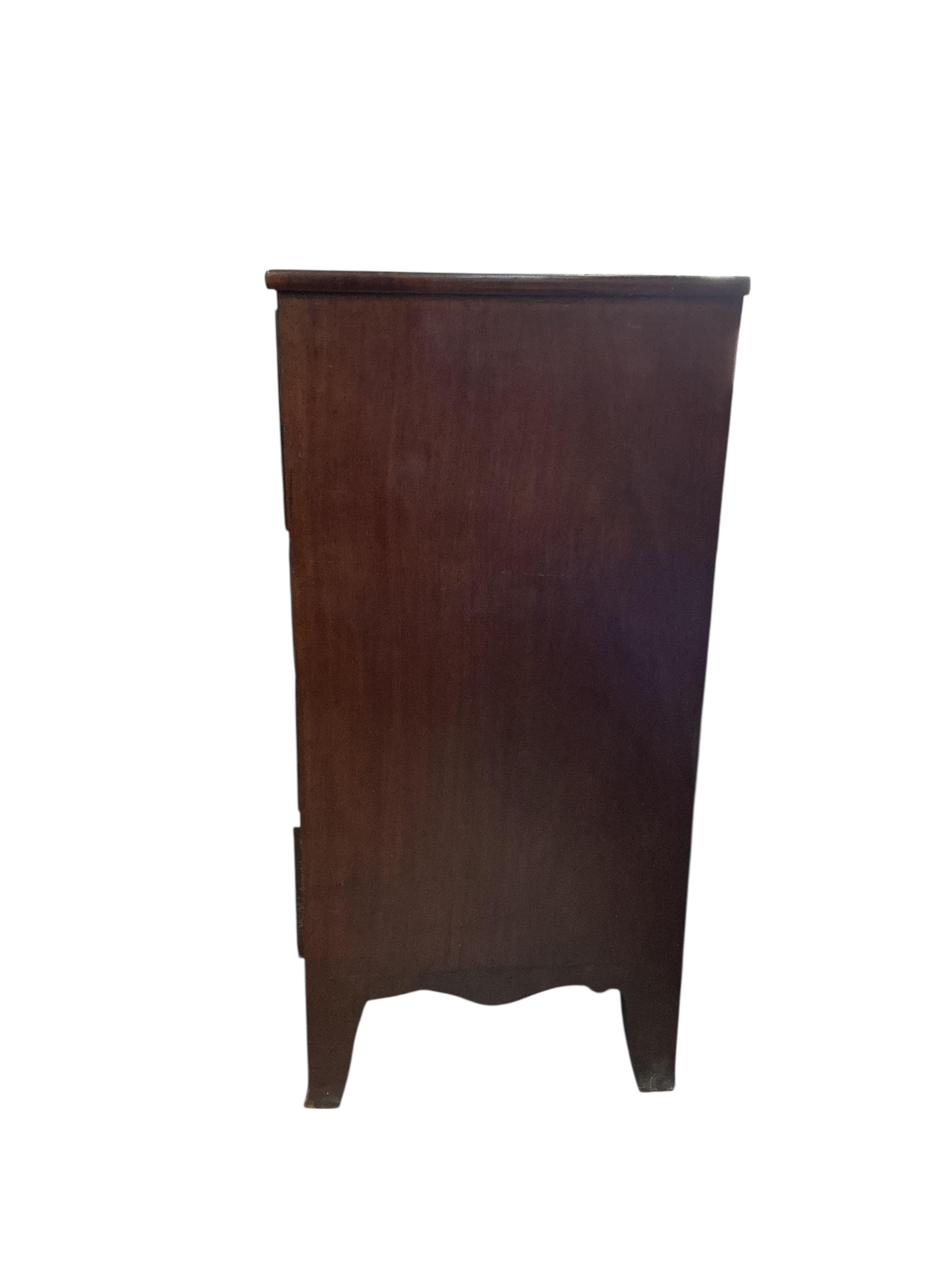 A George IV inlaid mahogany secretaire chest, width 124cm, depth 56cm, height 118cm